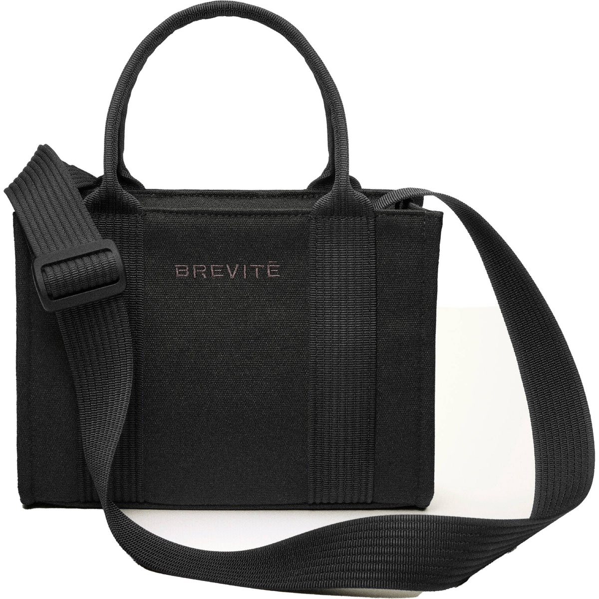 Bandolera Brevite The Anywhere Tote (Triple Negro) - puertos y conexiones