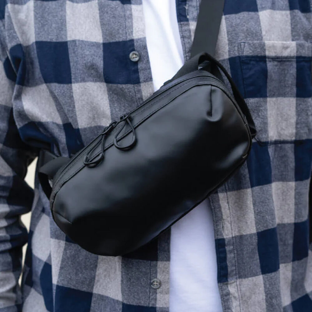 Riñonera WANDRD D1 Fanny Pack (Negro, 2L) - vista lateral