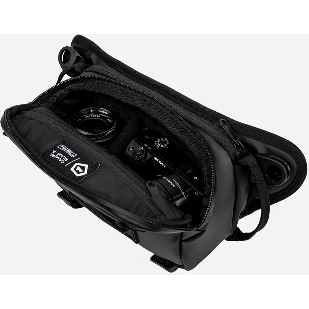 Sling WANDRD ROGUE V1 (Wasatch Verde, 3L) - puertos y conexiones