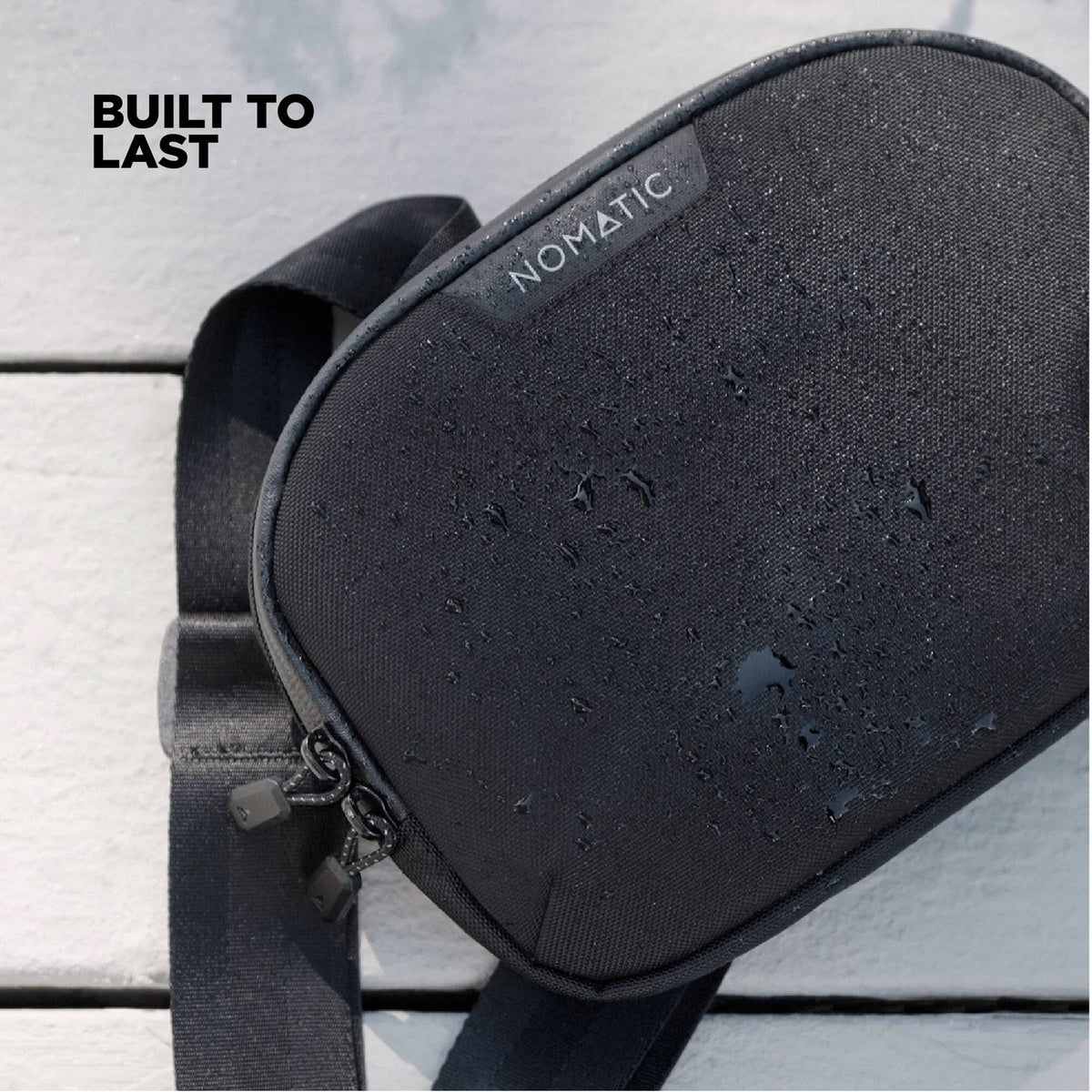 Bandolera Nomatic Access Sling (Negro, 0.5L) - contenido de la caja