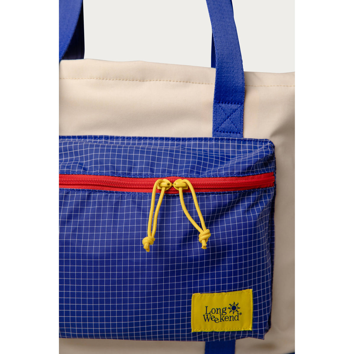 Bolso Long Weekend Beacon (Creme Multi, 18L) - puertos y conexiones