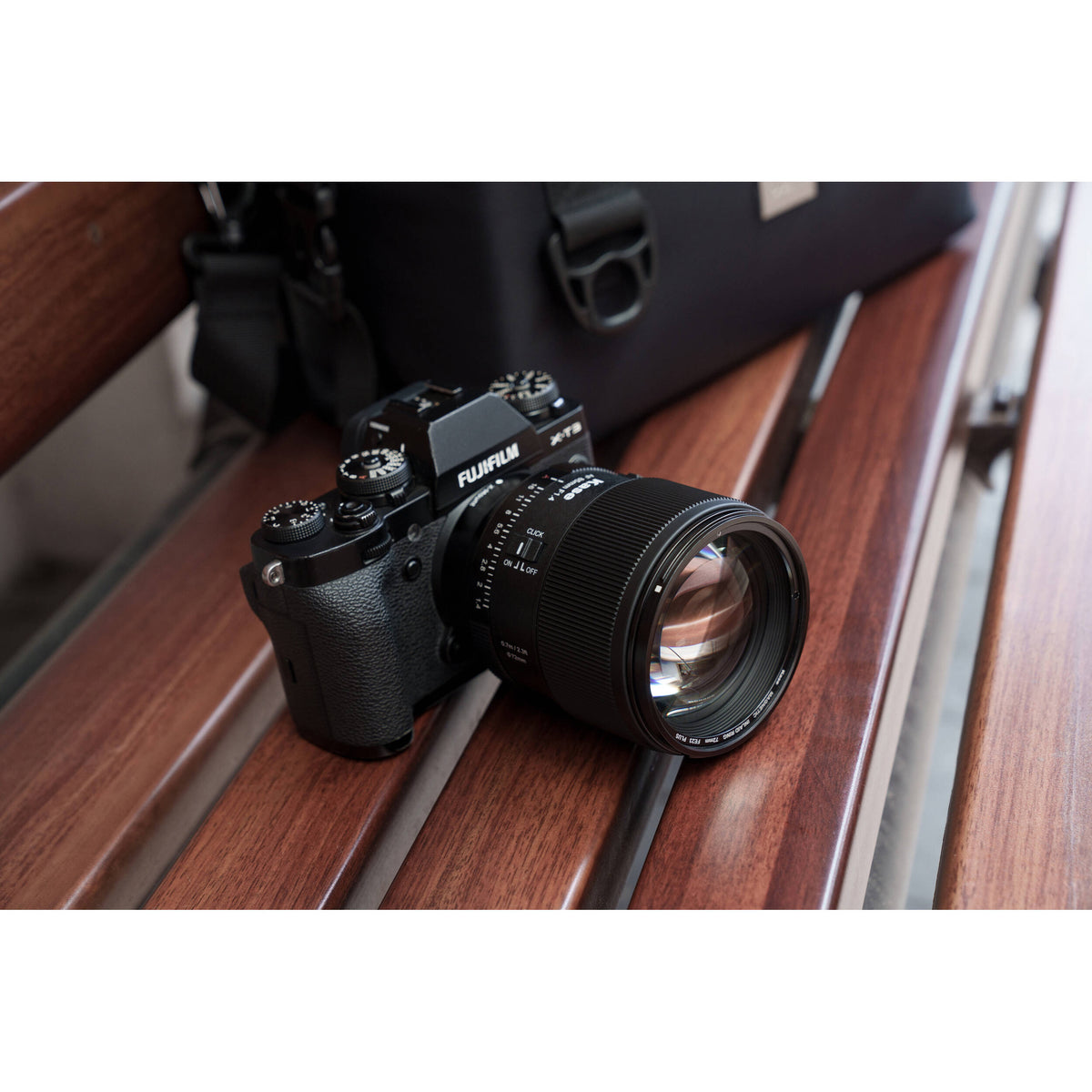 Lente Kase 85mm f/1.4 AF - contenido de la caja